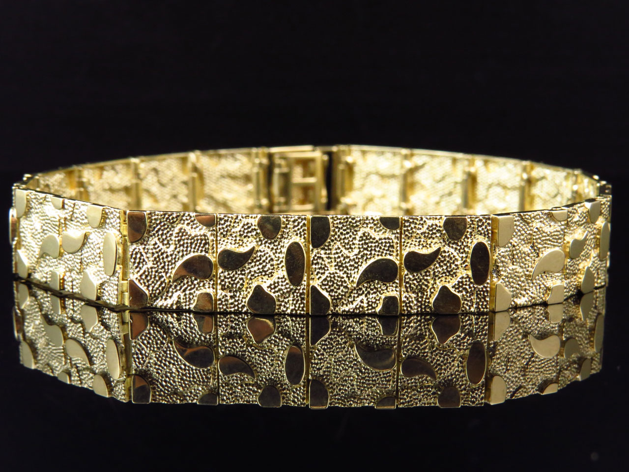 Дизайнерские браслеты из золота